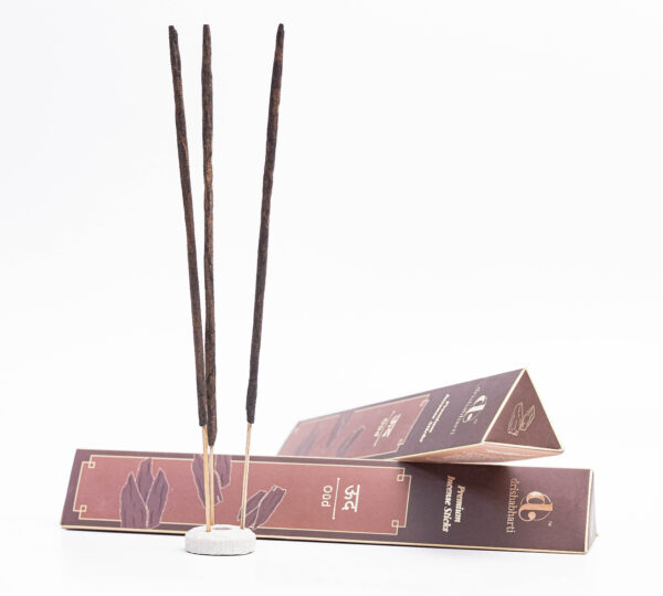 agarbatti product shoot, incense stick photography, brown agarbatti box, luxury incense packaging, e-commerce product photography, white background product photo