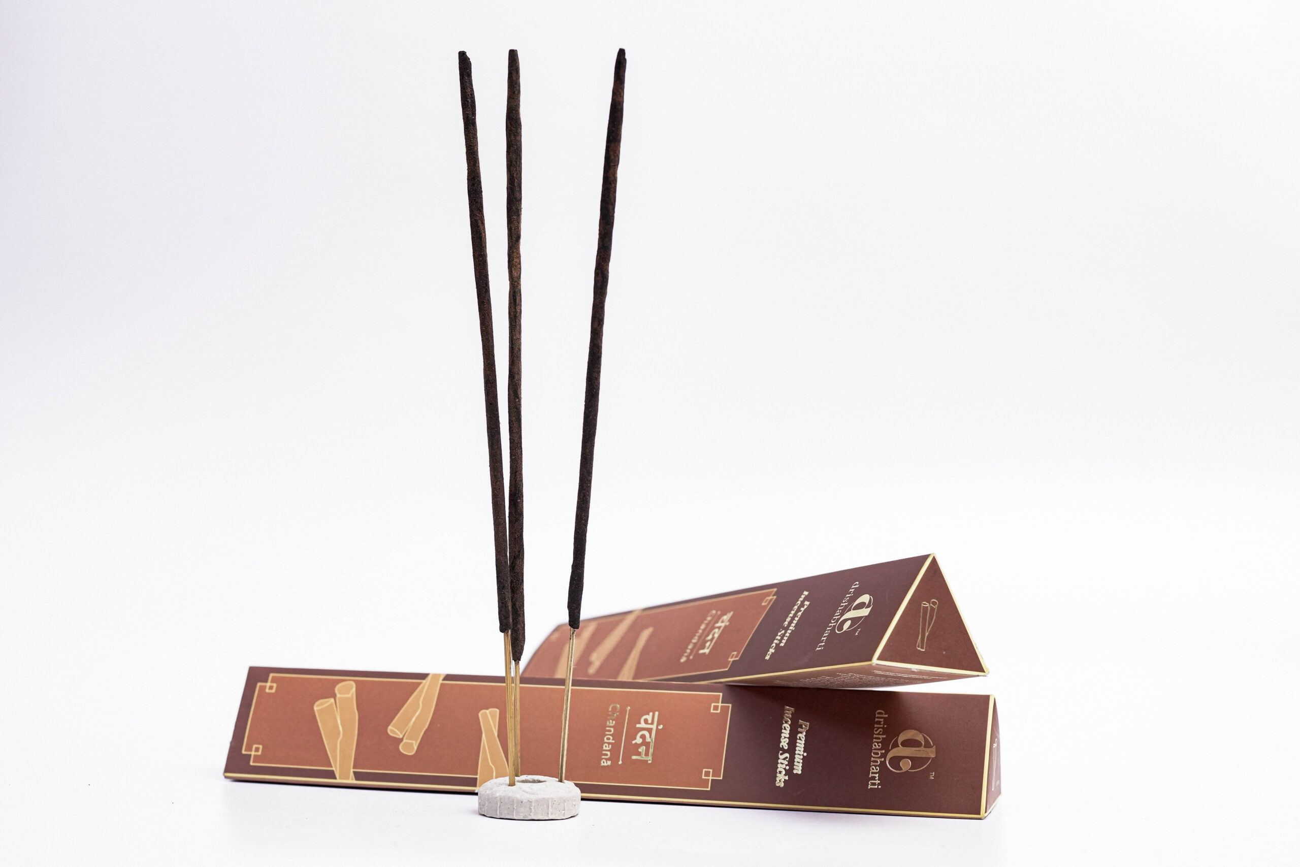 sandalwood incense sticks, chandan agarbatti shoot, brown incense box, studio product photo, white background amazon photography, agarbatti packaging shoot