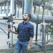 Videographer filming an interior design project with a professional cinema camera and gimbal