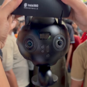 Insta360 Pro 2 camera on compact monopod during live outdoor crowd 360 videography production at Mumbai festival