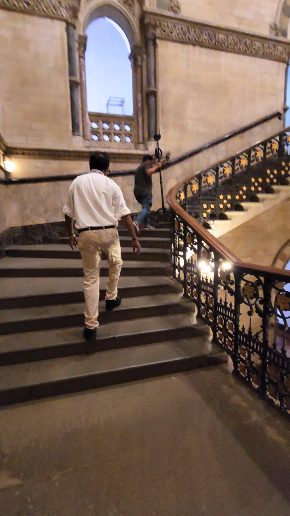 Insta360 videography camera setup on a historic staircase in Mumbai